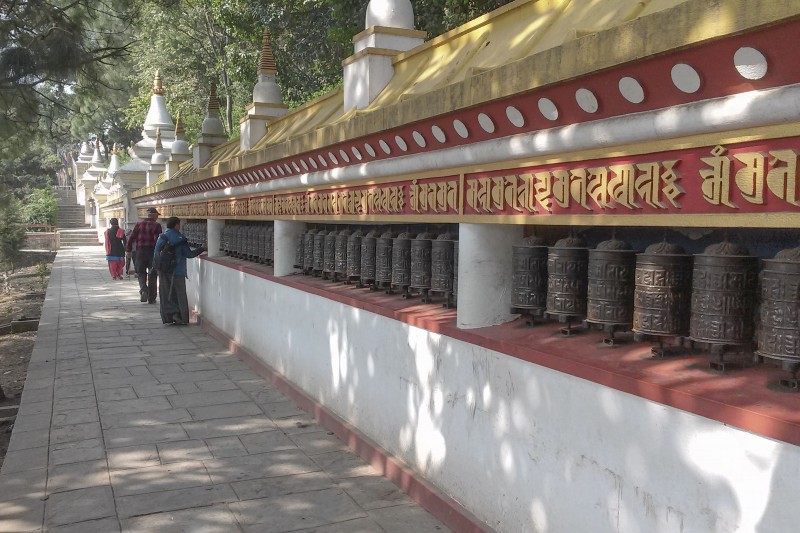 Buddhist prayer walking around stupa.